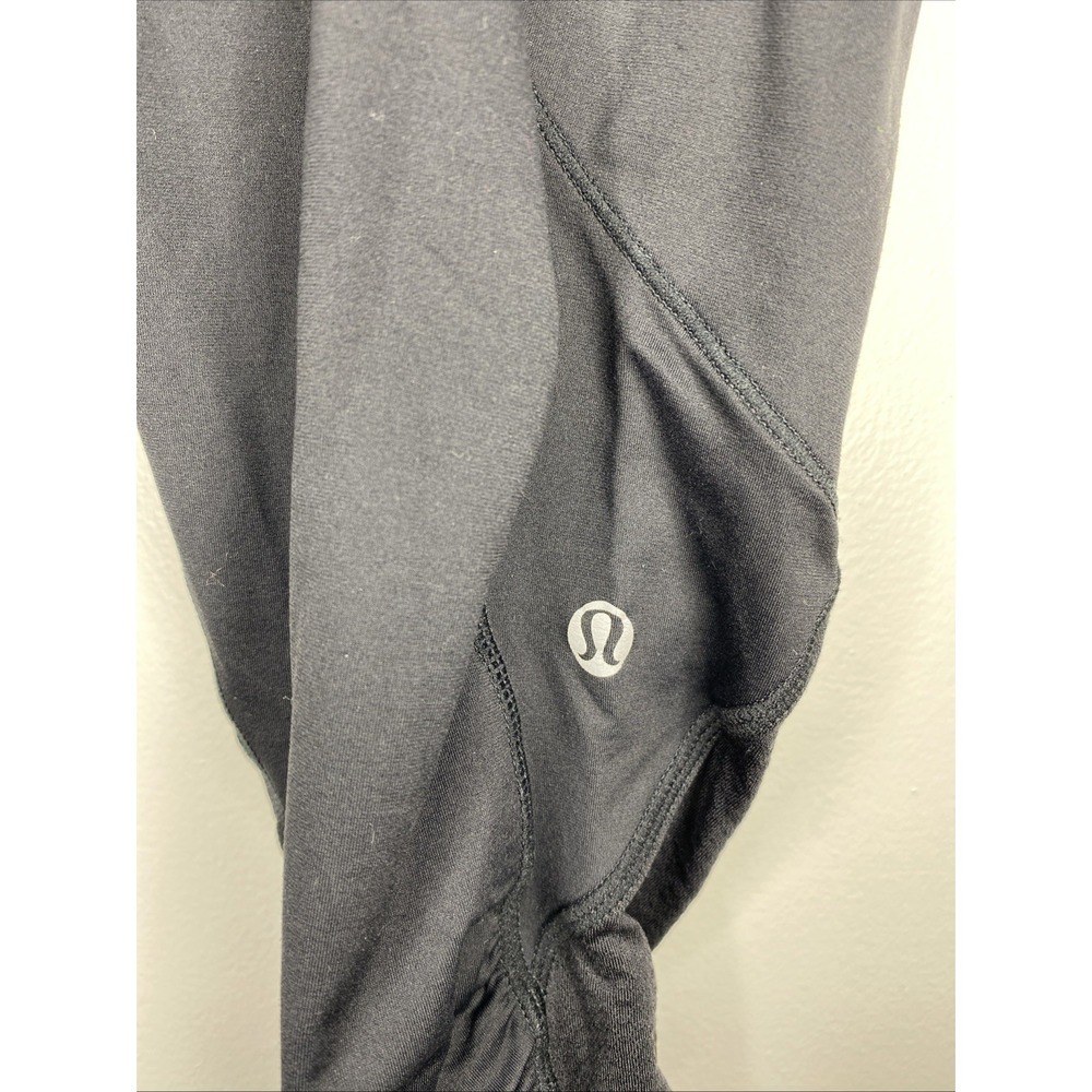 Lululemon Run a Marathon Crop Pant Size 10 Black Side Pockets Reflective Stripes - Picture 4 of 8